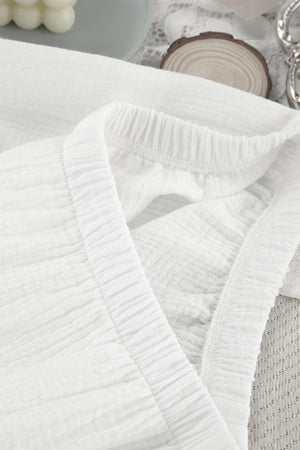 White gauze loungewear set with a V-neck and elastic waistband detail