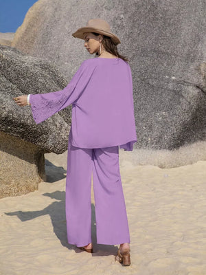 Purple lace-embellished open front set with wide leg pants and bell sleeves.