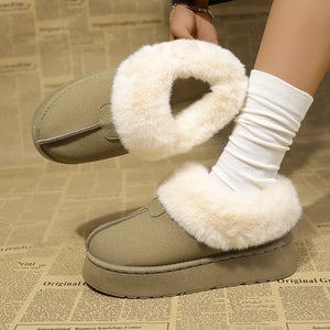 Matcha green plush suede platform slippers with cream faux fur lining and white socks.
