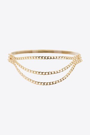 Gold chain belt with three cascading strands and a thin elastic band.