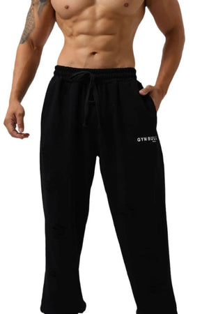 Black distressed jogger trousers with Gym Bull logo and drawstring waist.