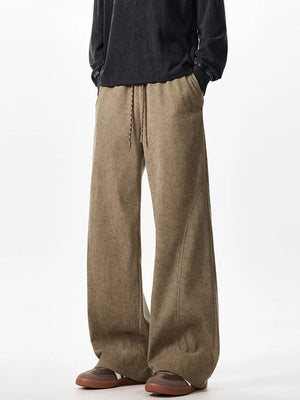 Textured wide leg drawstring sweatpants in khaki with a relaxed fit and adjustable waist.