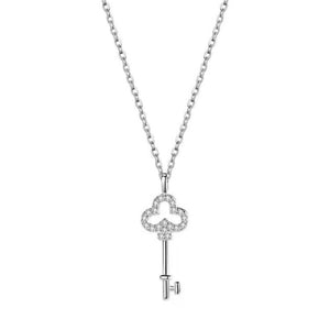Delicate silver key pendant necklace with clear crystal accents.