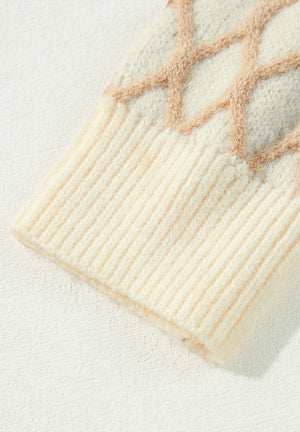Cream diamond knit sweater with balloon sleeves and ribbed cuffs.