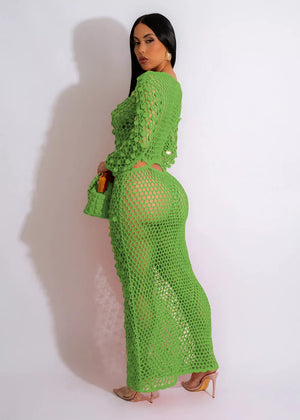 Green mesh cutout maxi dress with long sleeves and bodycon fit.