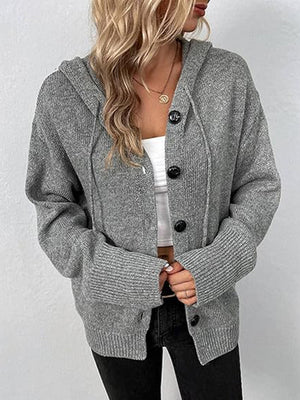 Gray ribbed knit hooded cardigan with button front and drawstring details.