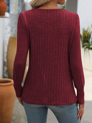 Burgundy ribbed knit long sleeve top with side button detail