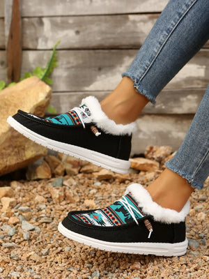 Southwestern print faux fur lined loafers in black with white laces and wooden bead detail.