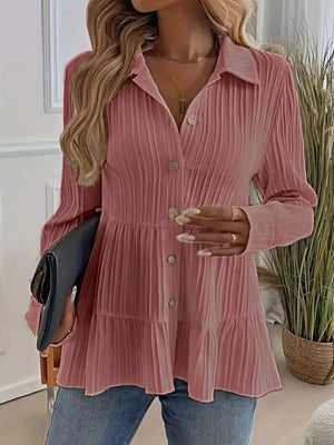 Textured tiered button-down shirt in dusty pink with a crinkled fabric and button details.