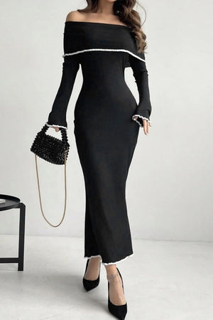 Black off-shoulder maxi dress with ruffled trim and long sleeves.