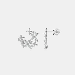 Silver floral cluster stud earrings with sparkling stones