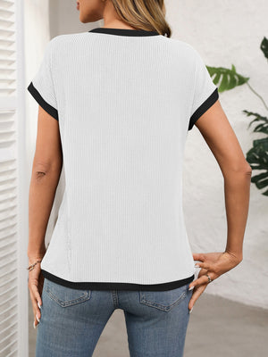White ribbed knit tee with black contrast piping on neckline and sleeves.
