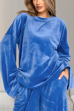 Blue velvet lounge set top with wide sleeves and pockets.