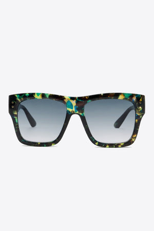 Prismatic square frame sunglasses with a multicolor tortoise shell pattern and gradient lenses.