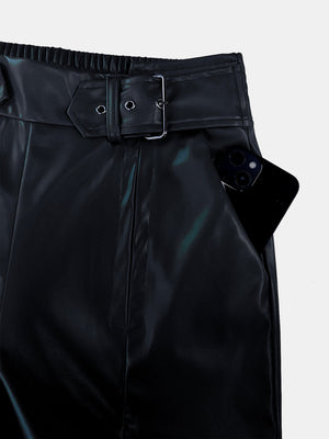 Black faux leather palazzo trousers with belted waist and pocket detail.