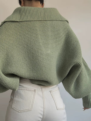 Army green knit sweater with wide collar and balloon sleeves.