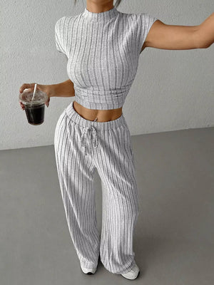 Grey ribbed knit crop top and drawstring pants set with vertical stripes