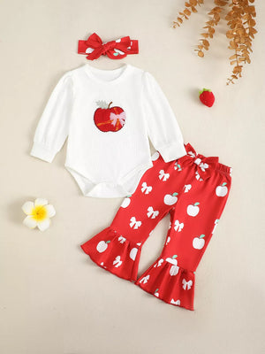 White ribbed long sleeve bodysuit with apple applique and red apple print bell bottoms with bows.