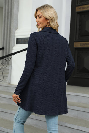 Dark Navy cable knit cardigan with a drape front and long sleeves.