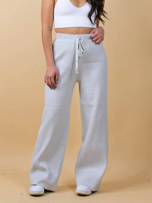 Light gray ribbed knit palazzo trousers with drawstring waist and wide leg