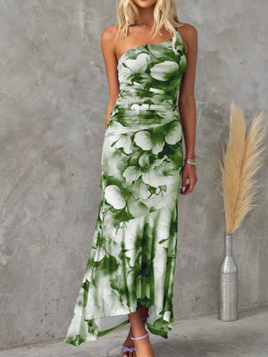 Olive green floral one-shoulder maxi dress with ruched bodice and asymmetrical hem.