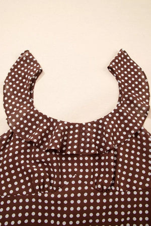 Brown polka dot maxi dress with ruffled neckline and polyester fabric.