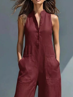 Wine red button-down sleeveless romper with pockets and collared neckline.