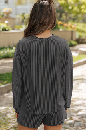 Black ribbed knit matching set with crew neck top and shorts