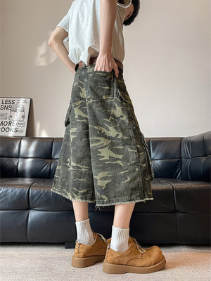 Men's vintage camouflage cargo capris with frayed hem and multiple pockets.
