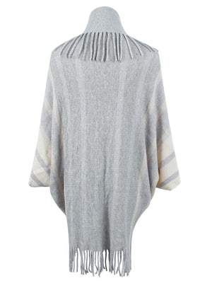 Textured fringe capelet in charcoal and ivory stripes with a high neck and fringed hem.