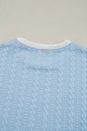 Light blue cable knit loungewear set with contrast white trim detail on neckline.