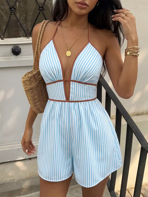 Blue and white striped halter neck romper with brown trim and plunging neckline.