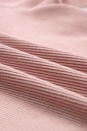 Dusty pink ribbed sweatshirt fabric detail