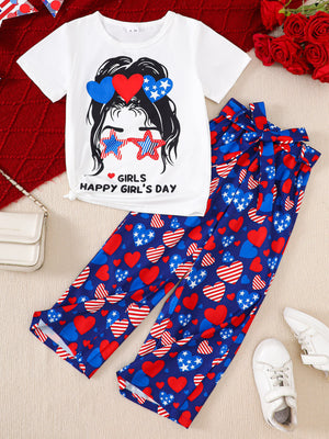 White graphic t-shirt and blue heart print pants set for girls