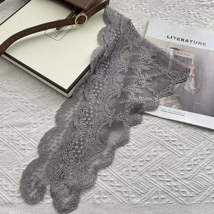 Gray floral lace scarf with scalloped edges and delicate pattern.