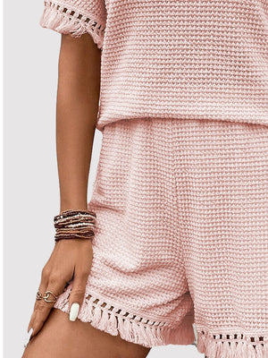 Blush pink waffle knit set with fringe trim on sleeves and shorts