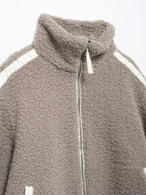 Dust Storm teddy fleece zip-up jacket with contrast piping and stand-up collar.