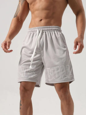 Gray mesh gym shorts with white graphic print and drawstring waist.