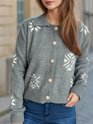 Gray snowflake knit cardigan with pearl button details and a collar.