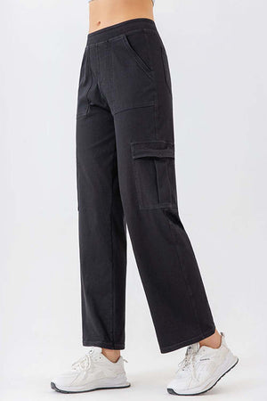 Black utility denim cargo pants with multiple pockets and a relaxed fit.