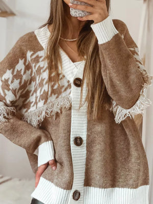 Brown acrylic houndstooth cardigan with fringe trim and button front.