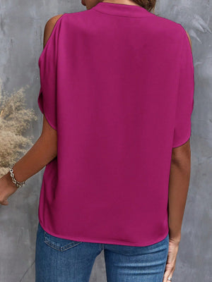 Open-shoulder blouse in magenta polyester with short sleeves and a keyhole neckline detail.