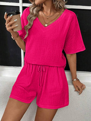 Hot Pink textured gauze lounge set with V-neck top and drawstring shorts.