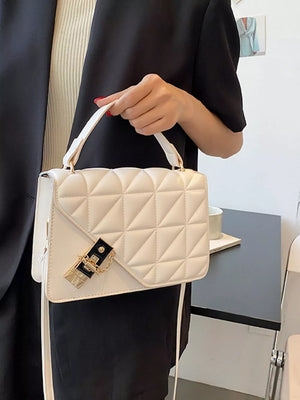 Diamond quilted PU leather crossbody bag in beige white with gold hardware and chain detail.