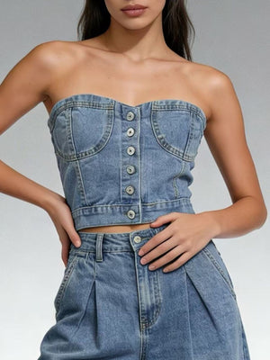 Structured denim tube top with button detail and sweetheart neckline, made of cotton.