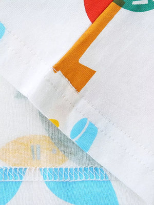 Toddler cotton tee with colorful marine print, showing stitching detail.