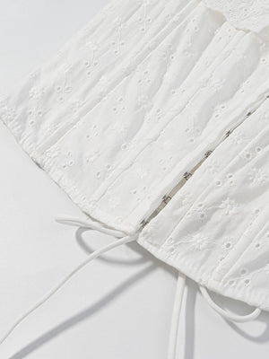 White eyelet tank top with corset detail and drawstring ties