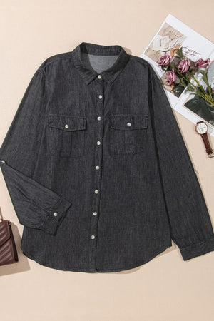 Relaxed black denim shirt with patch pockets and button front