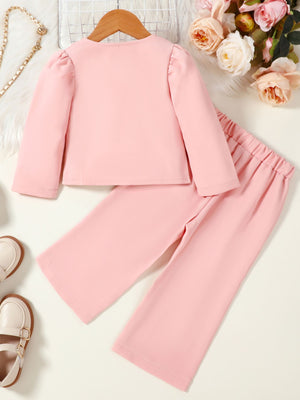 Toddler pink double-breasted blazer set with puff sleeves and wide-leg pants.
