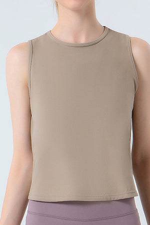 Sculpted Performance Tank Top in Tan with a round neckline and sleeveless cut.